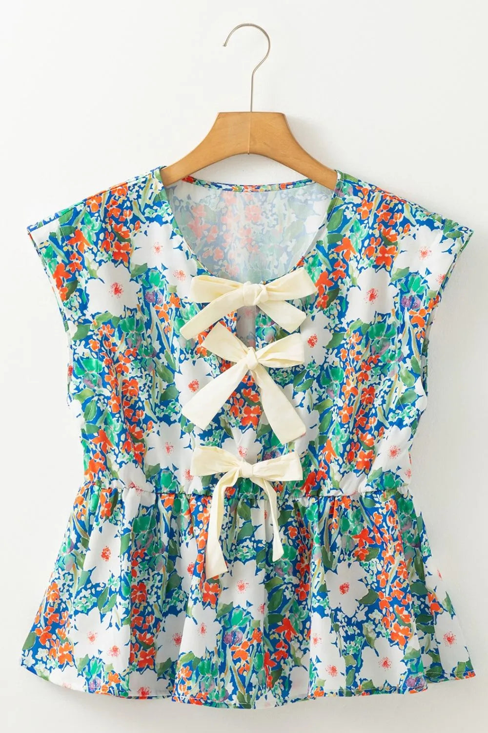 Floral Print Bow Applique Slit Sleeveless Peplum Blouse