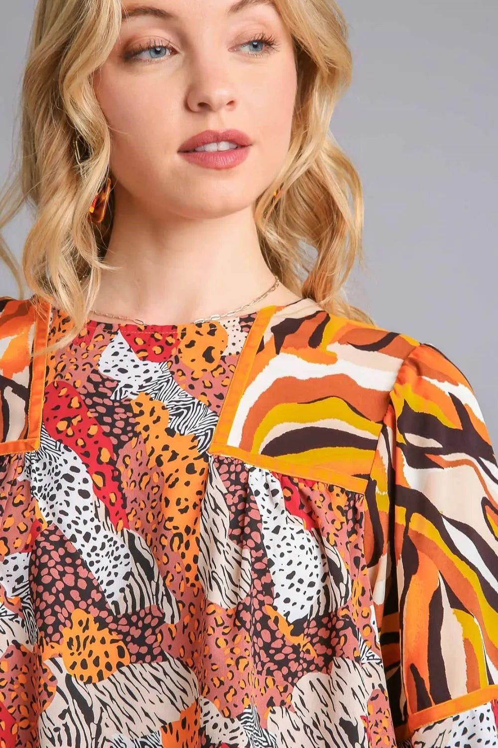Umgee Full Size Mixed Print Round Neck Flounce Sleeve Blouse Plus Size
