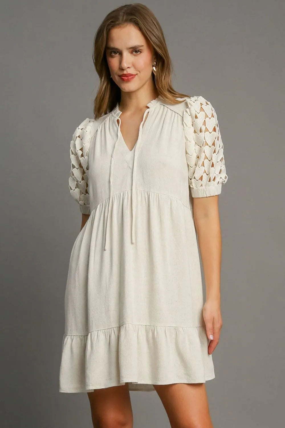 Umgee Full Size Ruffled Hem Heart Lace Sleeve Tie Neck Dress Plus Size Oatmeal