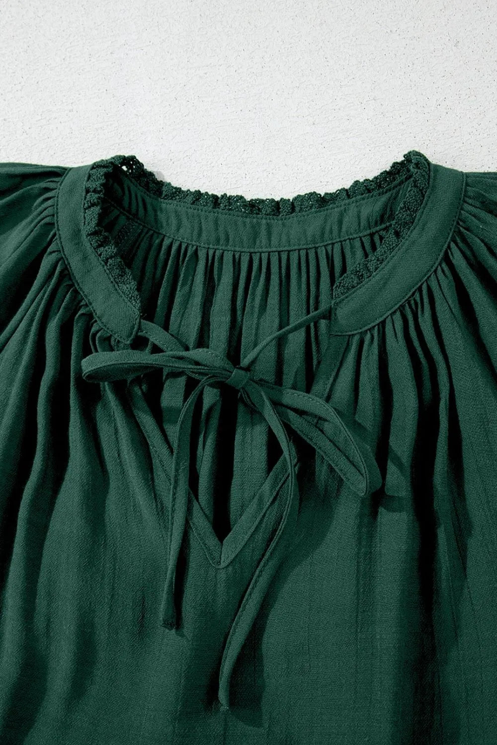 Eyelet Embroidered Sleeve Tie Neck Blouse