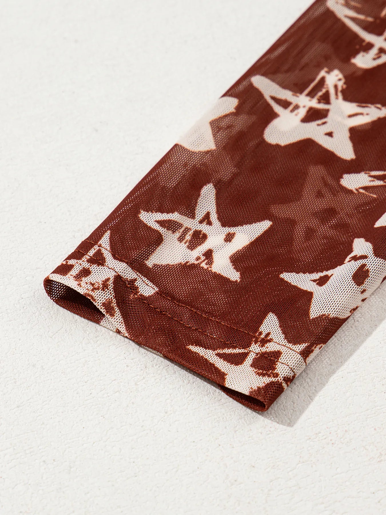 Star Print Long Sleeve Mock Neck Top
