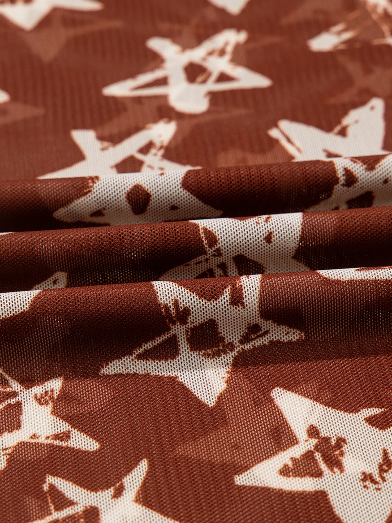 Star Print Long Sleeve Mock Neck Top