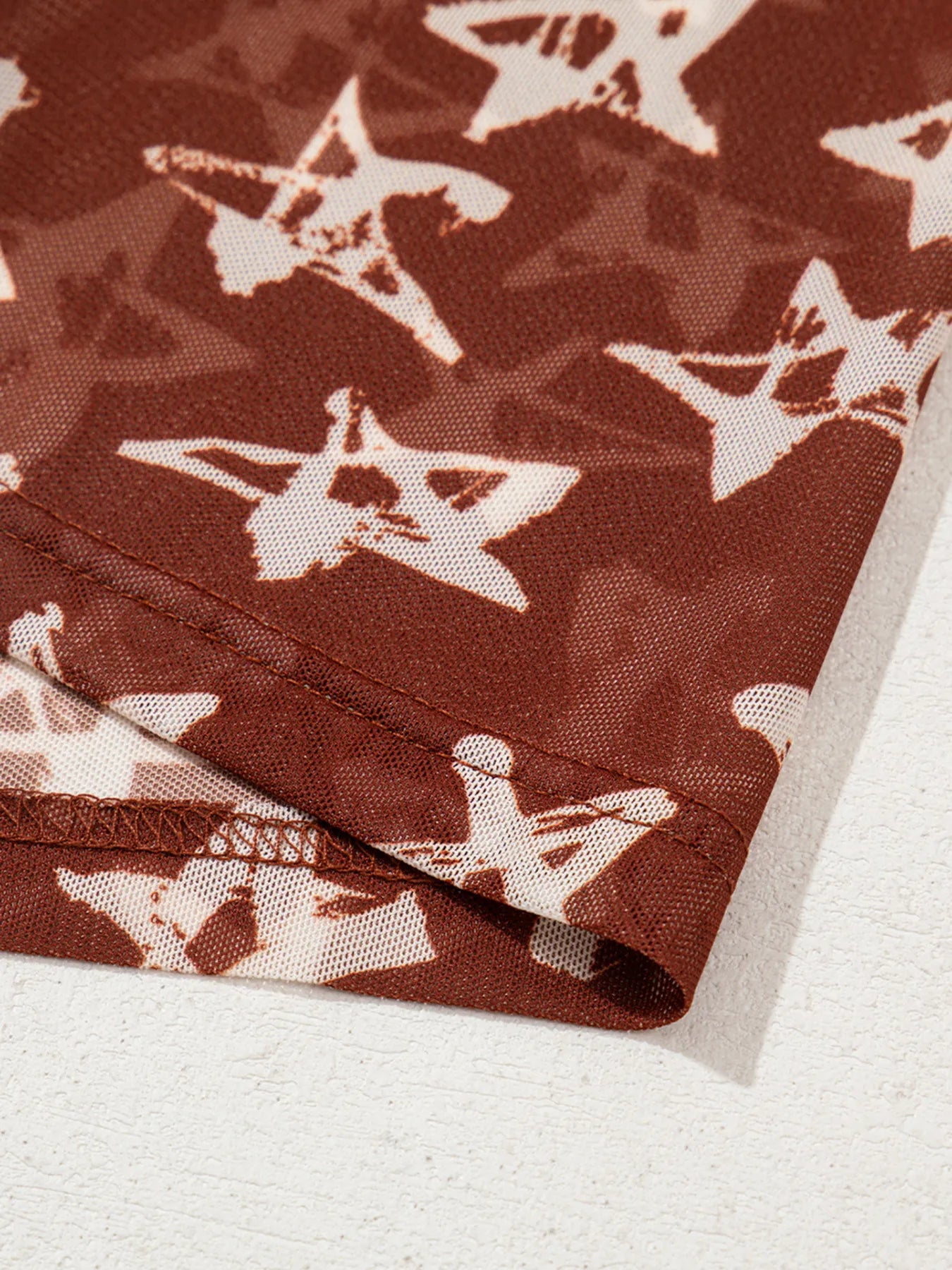 Star Print Long Sleeve Mock Neck Top