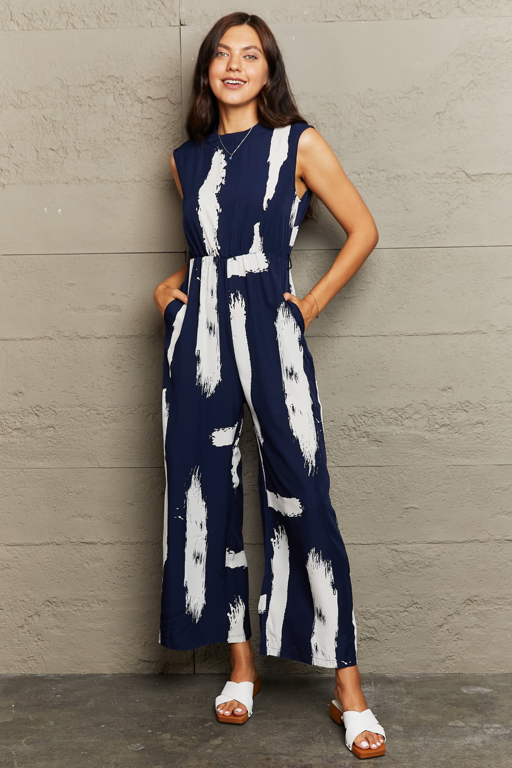Perfee Printed Round Neck Cutout Jumpsuit with Pockets Navy