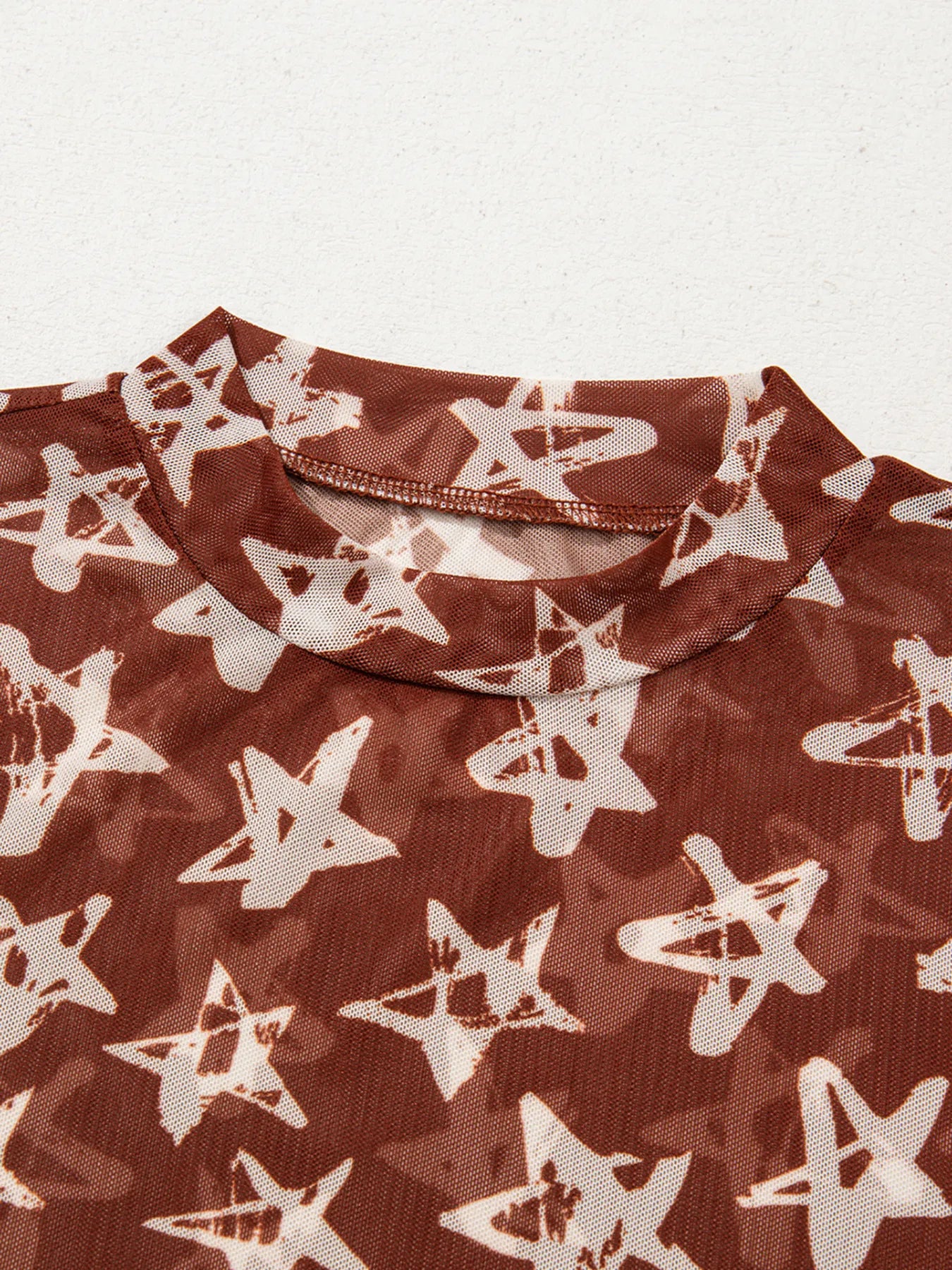 Star Print Long Sleeve Mock Neck Top